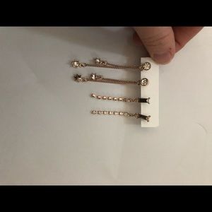 Never worn set of two rose gold earrings